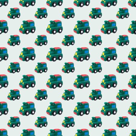 seamless pattern of rubber toy green train on whiteの写真素材
