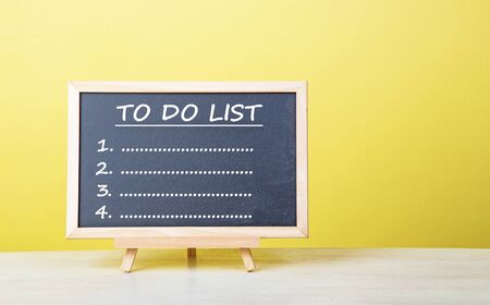 To do list word on a green blackboard.の写真素材