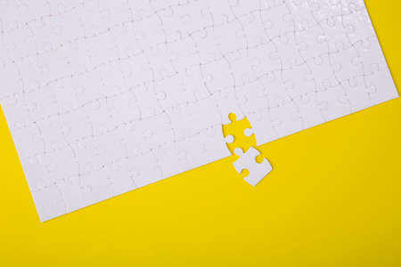 White jigsaw puzzle pattern background. jigsaw puzzleの写真素材