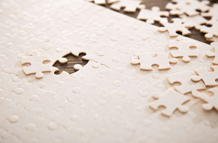 White jigsaw puzzle with blackground