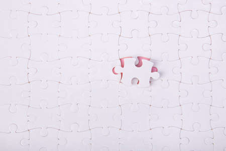 White jigsaw puzzle pattern background. jigsaw puzzleの写真素材