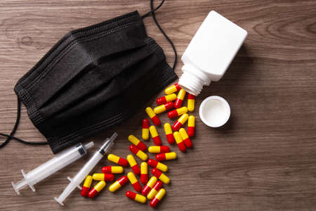 Protective medical mask and pills, Concept of corona virus protectionの写真素材