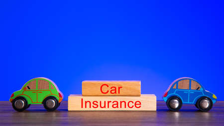 Wooden blocks with the word Car Insurance. Protection and Security Concept.の写真素材