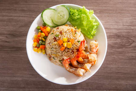chinese fried rice with barbecue prawnの写真素材