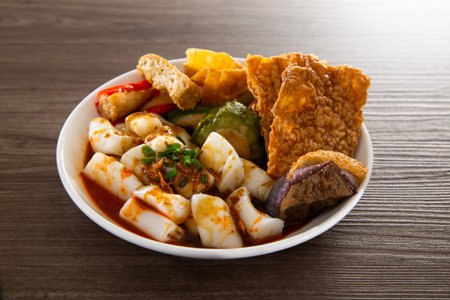 Chee Cheong Fun or Rice Noodle with sesame and sweet sauce served with yong tau fooの写真素材