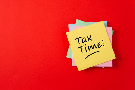Tax time - Notification of the need to file tax returns and tax form with empty space for text.の写真素材