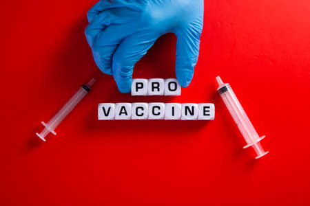Pro-vaccine symbol. Doctor hand  with words 'pro-vaccine'. Medical  pro-vaccine concept.