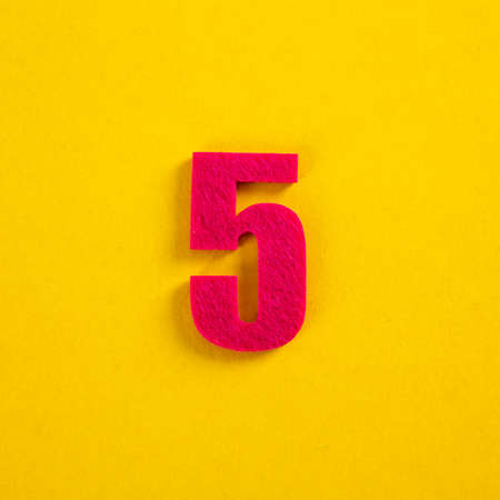 colorful number on yellow backgroundの写真素材