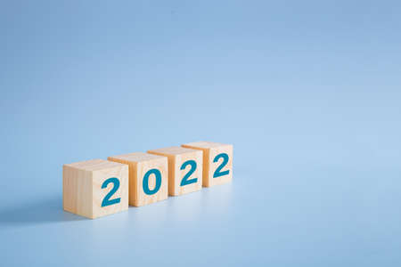 2022 number on wooden block on blue background - 2022 new year conceptの写真素材