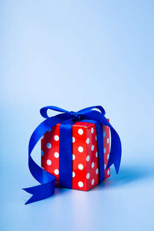 Christmas composition. Christmas gifts, decorations on blue background.の写真素材