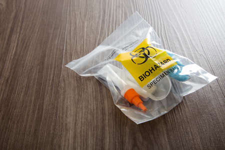 Covid-19 Rapid Antigen Test kit and biohazard specimen bagの写真素材