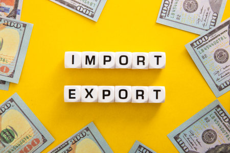 Import and export word on yellow backgroundの写真素材