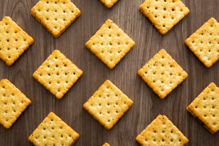 Biscuit with chocolate filling on wooden table