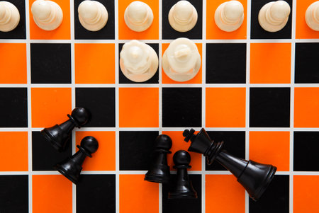 Checkmate opponent during chessboard competition. Strategy and business planning conceptの写真素材