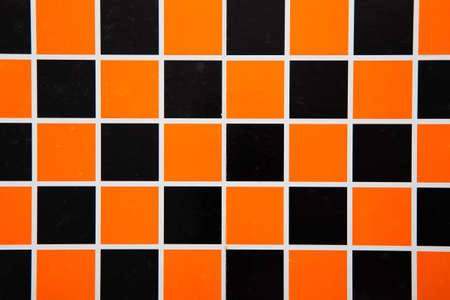 Black and orange background checker board