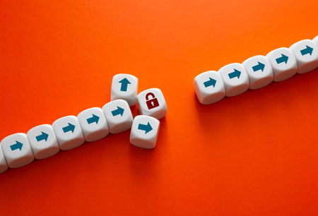 White cubes representing progress encountering a red padlock hurdle