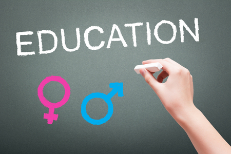 Hand writing with chalk sex education concept on blackboardの写真素材