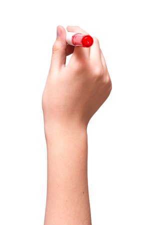 Hand is drawing with red marker Isolated on whiteの写真素材