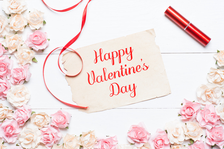 Happy Valentine's Day concept on vintage paper sheet with rosesの写真素材