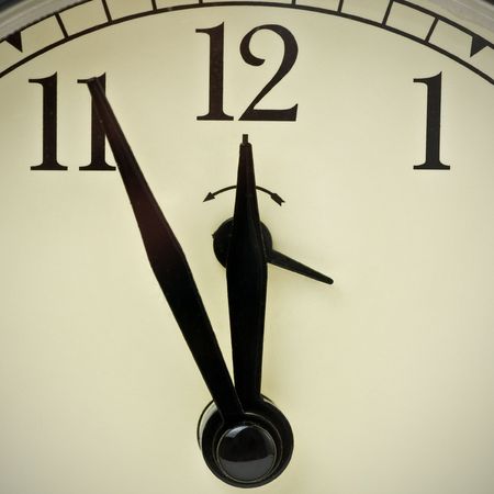 Clock at five minutes to twelve
