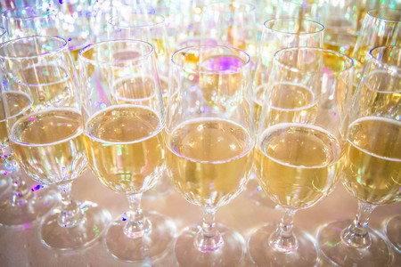 Champagne in flute glasses at a partyの写真素材