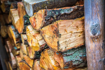 Pile of chopped fire wood prepared for winter