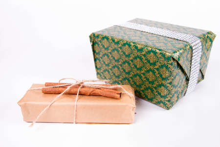 Gift box wrapped in craft paper tied with twine and tied with twine.の写真素材