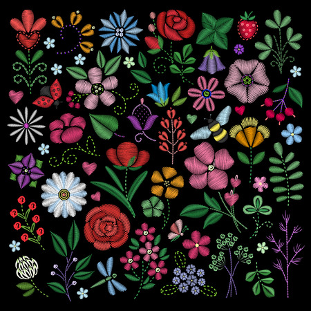Embroidery elements. Flowers, leaves, dragonflies, butterflies embroidered on black background.の写真素材