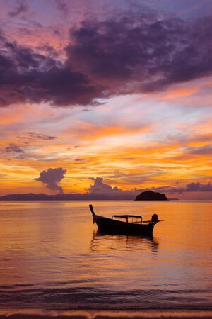 Boat on Sunrise Beach at Koh Lipe, Thailandの写真素材