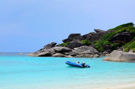 Motor boat dinghy on seaの写真素材