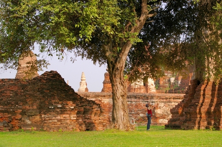Tourist take a photo at Wat Pra Si San Phet, Ayuthaya Province, Thailandの写真素材