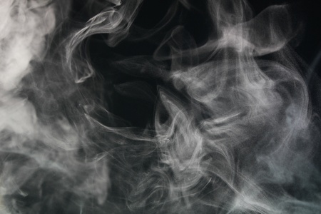 an abstract smoke picture in front of a black backgroundの写真素材