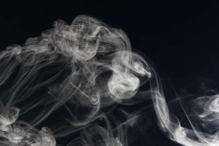 an abstract smoke picture in front of a black background
