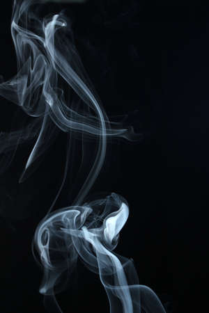 an abstract smoke picture in front of a black backgroundの写真素材