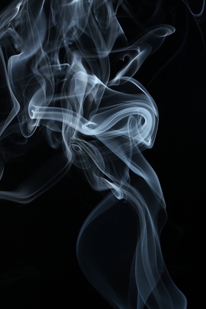 an abstract smoke picture in front of a black backgroundの写真素材