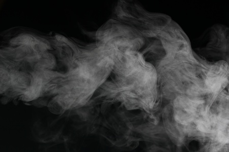 an abstract smoke picture in front of a black backgroundの写真素材