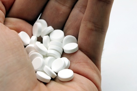 tablets in a handの写真素材