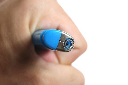 blue lighter in human hand