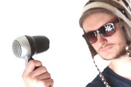 funny guy with hairdryerの写真素材