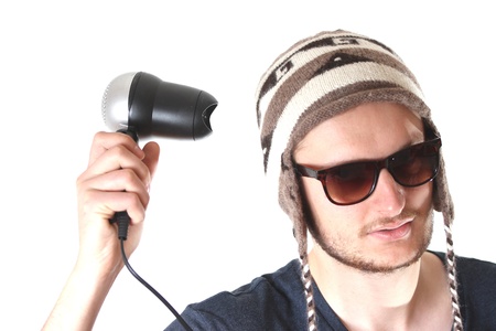 funny guy with hairdryerの写真素材