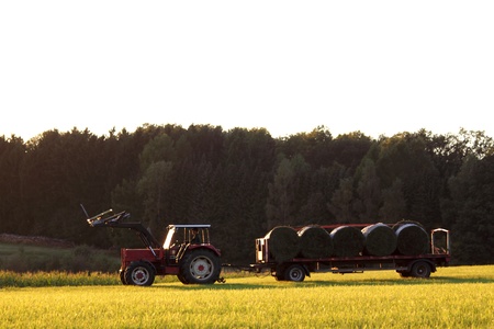 tractor with hay balesの写真素材