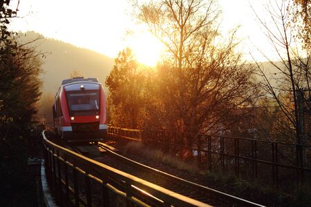 german country train on a golden autumn dayのeditorial素材