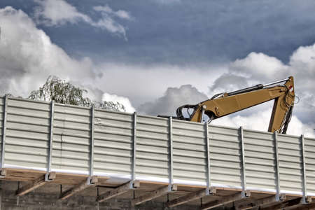 excavator on a bridge hdrの写真素材