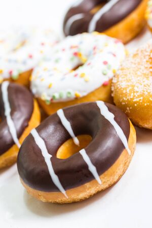 a diversity of different donutsの写真素材