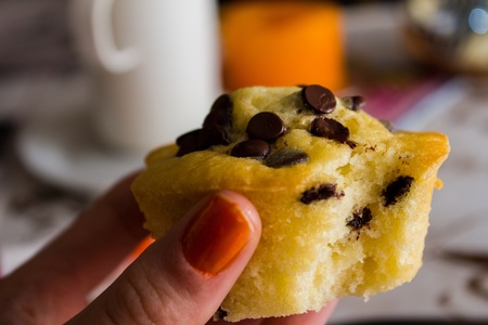 eating a fresh muffinの写真素材