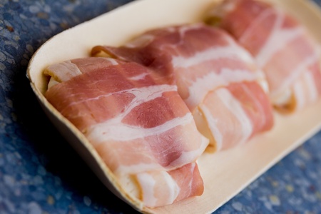 delicous grilled bacon around sheep cheeseの写真素材