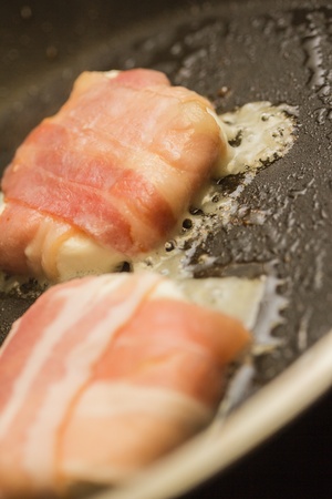 delicous grilled bacon around sheep cheeseの写真素材