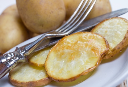 baked homemade potato slicesの写真素材