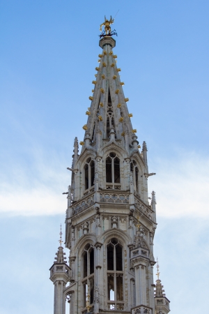 brussels city hall tower with archangel michael statueの写真素材
