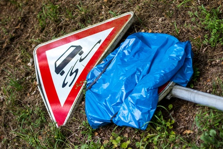 damaged german street signの写真素材